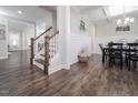 Elegant dining room with coffered ceilings, shiplap accent wall, and hardwood floors at 301 Porter Hill Dr, Youngsville, NC 27596