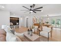Bright and airy living room featuring hardwood floors, modern furniture, and stylish decor at 3032 Dixon Rd, Durham, NC 27707