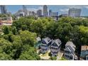 A beautiful aerial view of the neighborhood homes and the city skyline in the background at 507 Rosengarten Aly, Raleigh, NC 27603