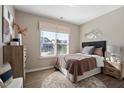 Cozy bedroom with ample natural light, wood floors, and neutral decor at 70 Freedom Heights Ln # 149, Smithfield, NC 27577