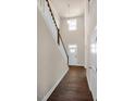 Spacious foyer with hardwood floors, stairs to the second floor, and natural light at 1113 Dartford Green Pl, Wake Forest, NC 27587