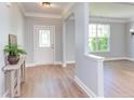 Bright foyer with new floors leading to a large, open living area at 12320 Tetons Ct, Durham, NC 27703