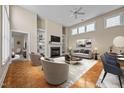 Bright living room features a fireplace, built-in shelves, and elegant furniture at 23 Caldwell, Pittsboro, NC 27312