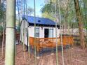 Charming guest house with a small deck, nestled among bamboo trees at 2907 University Dr, Durham, NC 27707
