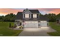 Charming two-story home with a spacious driveway and a welcoming front porch in a lovely neighborhood at 385 Jackson Pond Dr, Smithfield, NC 27577