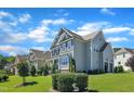 Well-maintained home with lush landscaping, spacious lawn, and attached two-car garage at 503 Bendemeer Ln, Rolesville, NC 27571