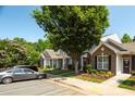 Street view of beautiful townhomes with mature trees and landscaping at 1076 Kelso Ln, Burlington, NC 27215
