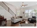 Cozy living room featuring high ceilings, lots of natural light, and hardwood floors at 220 W Winmore Ave, Chapel Hill, NC 27516