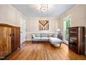 Cozy living room featuring hardwood floors and neutral wall colors at 2409 Basil Dr, Raleigh, NC 27612