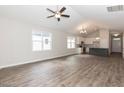 Spacious living room featuring luxury vinyl plank flooring, recessed lighting, and lots of natural light at 510 Branch St, Rocky Mount, NC 27801