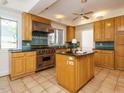 Traditional kitchen featuring a center island, stainless steel appliances, and ample cabinet space at 907 W Johnson St, Raleigh, NC 27605