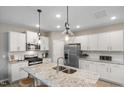 Gourmet kitchen featuring granite counters and stainless steel appliances at 2301 Edenberry Ln, Fuquay Varina, NC 27526