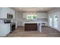 A beautifully designed kitchen with stainless steel appliances and ample counter space at 2725 Gross Ave, Wake Forest, NC 27587
