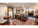 Elegant living room with hardwood floors, fireplace, and refined furnishings, perfect for entertaining and relaxation at 815 Marlowe Rd # 10, Raleigh, NC 27609