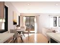 Elegant dining area with table and chairs, bright lighting, and seamless transition to living space at 1017 N Buchanan Blvd # C, Durham, NC 27701