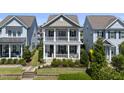 Charming two-story home with double porches and well-maintained landscaping at 1604 Upper Park Rd, Wake Forest, NC 27587