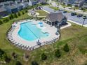 Aerial view of a neighborhood pool showcasing the pool's size and surrounding amenities at 1745 Ripley Woods St, Wake Forest, NC 27587