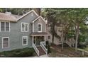 Charming two-story home featuring a covered front porch with a landscaped front yard at 1815 Crystal Downs Lane, Raleigh, NC 27604