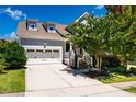 Beautiful two-story home with a wide driveway and attached two-car garage at 42 Juneberry Dr, Chapel Hill, NC 27516