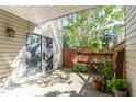 Outdoor patio area perfect for relaxation, featuring a wooden fence and access via sliding glass doors at 435 Summerwalk Cir # 435, Chapel Hill, NC 27517