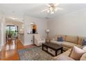 Spacious living room with hardwood floors and a comfortable seating area at 4533 Pale Moss Dr, Raleigh, NC 27606