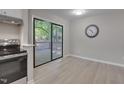 Bright dining area with sliding glass doors leading to an outdoor deck at 5905 Westcreek Pl, Raleigh, NC 27606
