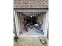 View of the garage, showcasing ample storage and a variety of equipment at 651 Berry Chase Way, Cary, NC 27519