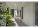 Cozy front porch with rocking chairs and ample space for relaxation at 7917 Rooksley Ct, Raleigh, NC 27615