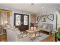 Cozy living room with stylish furniture, hardwood floors, and elegant decor at 810 Grovemont Rd, Raleigh, NC 27603