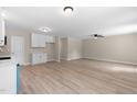 Spacious living room featuring new wood floors and neutrally painted walls at 810 Williams St, Burlington, NC 27217