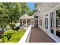 Spacious backyard with a deck, screened porch, and beautiful waterfront views at 81002 Alexander, Chapel Hill, NC 27517