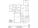 Detailed first-floor blueprint, featuring kitchen, primary bedroom, and garage with precise measurements at 1021 Manchester Dr, Raleigh, NC 27609