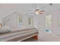 Cozy bedroom featuring neutral colors, a ceiling fan, and two windows for ample natural light at 112 Barcelona Ct, Cary, NC 27513