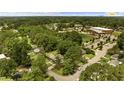 An aerial view of the property surrounded by lush trees, showing proximity to Raleigh at 202 Purvis St, Garner, NC 27529