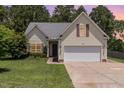 Charming single-Gathering home with a well-manicured lawn, two-car garage, and attractive exterior in a lovely neighborhood at 127 Strike Eagle Dr, Broadway, NC 27505