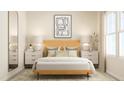 Beautiful bedroom with wooden bed frame, nightstands, lamps, artwork, and large windows with natural light at 180 Digging Time Ave, Princeton, NC 27569