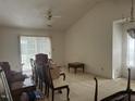 Bright living room with high ceilings and large windows offers ample natural light at 1819 Collier Rd, Durham, NC 27707