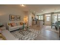 Open floor plan showing a seamless transition from the living room to the kitchen and dining areas at 366 Church St # 58, Wendell, NC 27591