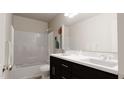 Bathroom featuring a double sink vanity, shower and tub combo at 40 Digging Time Ave, Princeton, NC 27569
