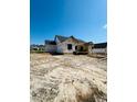 View of new home build featuring a covered porch, and Tyvek HomeWrap at 128 Seahawk Way, Zebulon, NC 27597