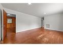 Spacious living room with hardwood floors and abundant natural light, perfect for Gathering gatherings at 2512 Mckinney St, Burlington, NC 27217