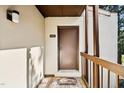 Welcoming front entrance with a charming welcome mat, adding a touch of home at 5082 Flint Ridge Pl, Raleigh, NC 27609