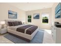 Serene main bedroom with modern decor, featuring ample natural light and neutral tones at 823 Biltmore Dr, Sanford, NC 27332