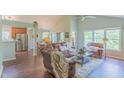 Spacious living room showcasing vaulted ceilings, hardwood floors, and an open floor plan at 0317 Glen Echo Ln # C, Cary, NC 27518