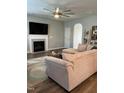 Cozy living room features a fireplace, plush sectional sofa, and neutral color palette for a relaxed atmosphere at 109 E Webber Lane Ln, Clayton, NC 27527