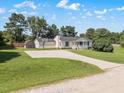 Charming home with basketball court, storage shed, and well-manicured lawn in a picturesque setting at 111 Marshay Meadow Rd, Youngsville, NC 27596