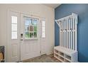 Bright entryway featuring a hall tree and storage bench at 1137 Amber Shadow Dr, Durham, NC 27703