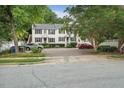 Charming two-story townhome featuring classic design and well-maintained landscaping at 2603 Stafford Ave # Apt C, Raleigh, NC 27607