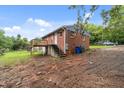 The backyard features a deck with convenient access and a spacious area at 807 New St, Graham, NC 27253