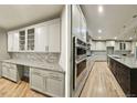 Beautiful kitchen with a center island, granite countertops, stainless steel appliances, and ample cabinet space at 97 Fox Oak Trl, Pittsboro, NC 27312
